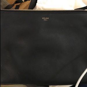 Black Celine trio with gold hardware/ detailing.